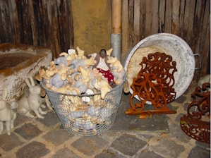 A mischievous animated pig surrounded by wooden crates and scrap metal, causing playful chaos.