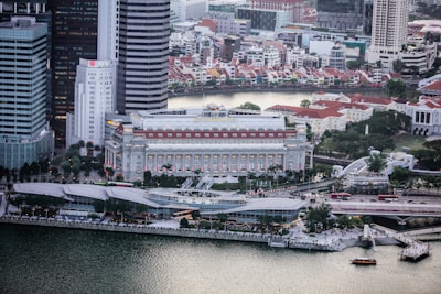 a large cruise ship docked in a city