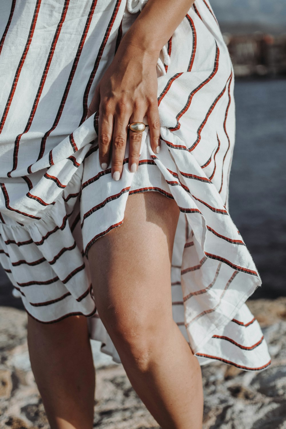 a person wearing a striped shirt