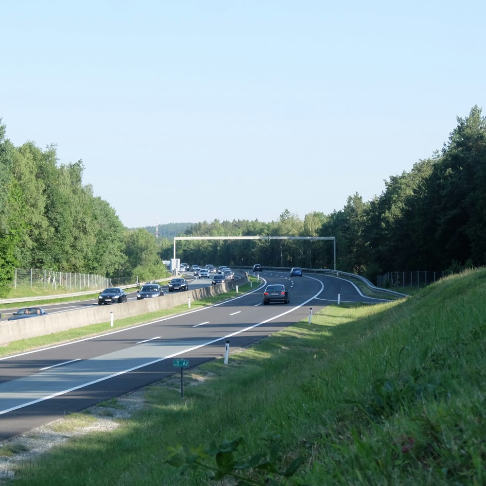 a highway with cars on it