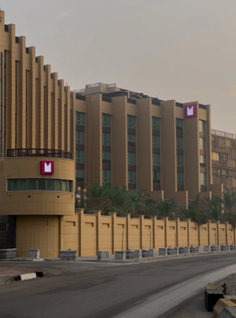 Front view of the Polo Hub Network building on Takari Road, Vasai East.