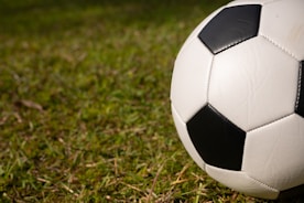 a football ball on the grass