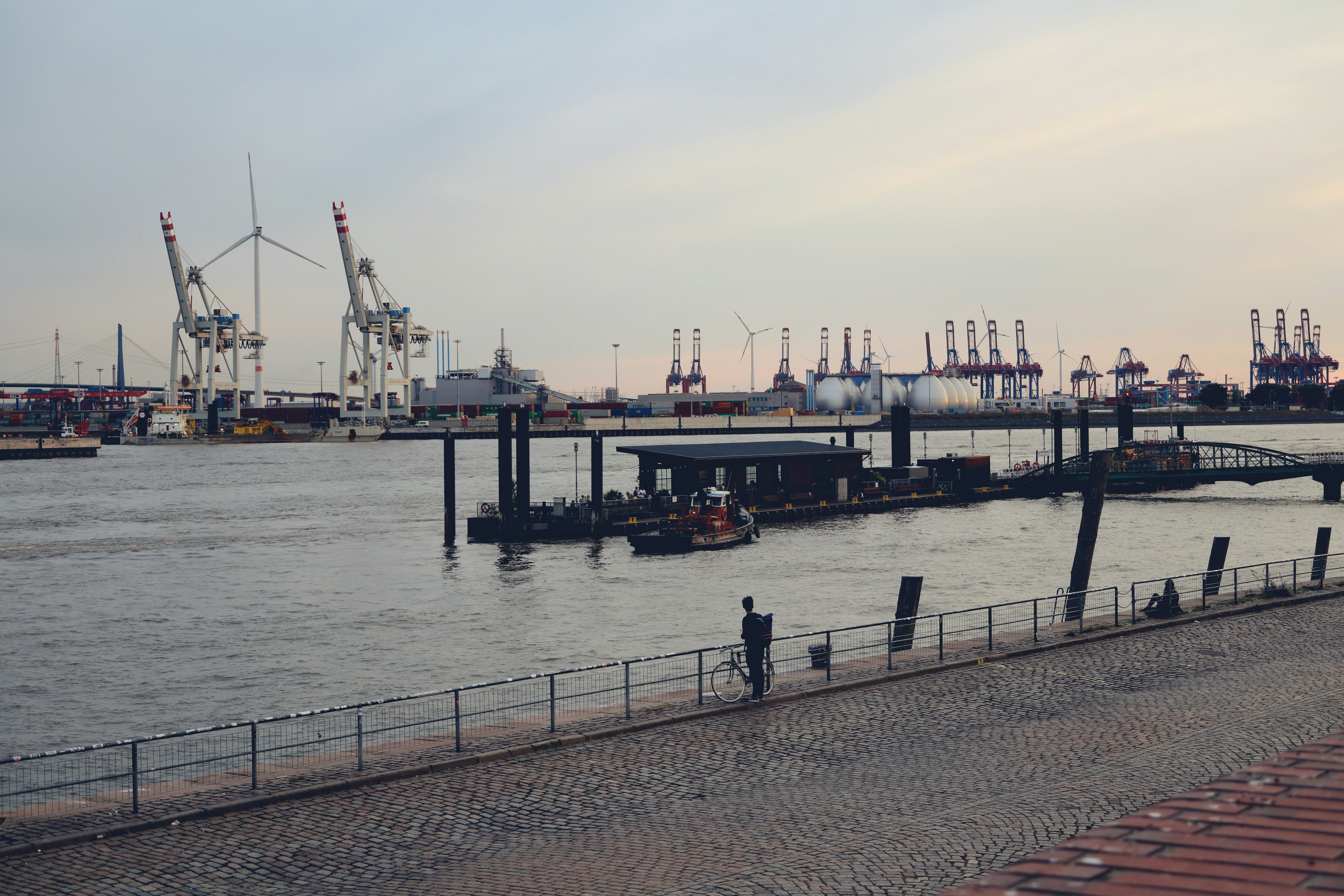 a body of water with a dock and a boat in it