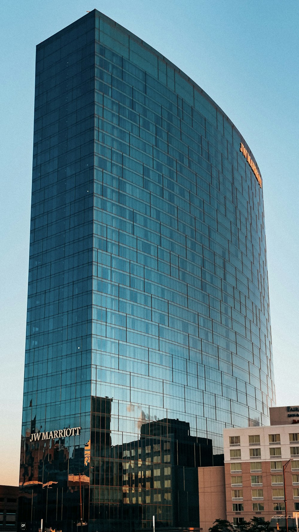 a tall glass building with 333 Wacker Drive in the background