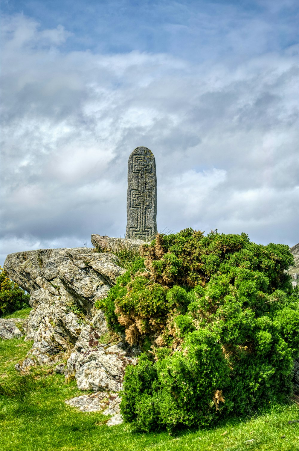 a stone tower on a hill