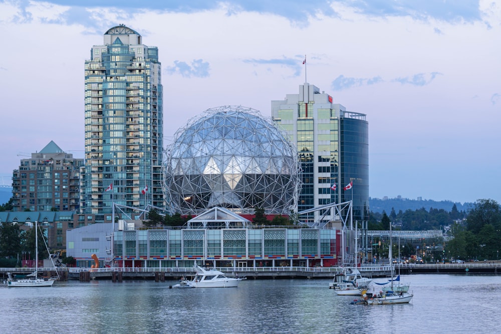 a group of buildings next to a body of water