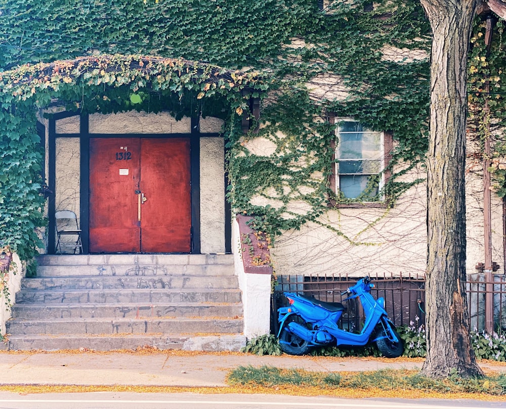 a motorcycle parked outside a house