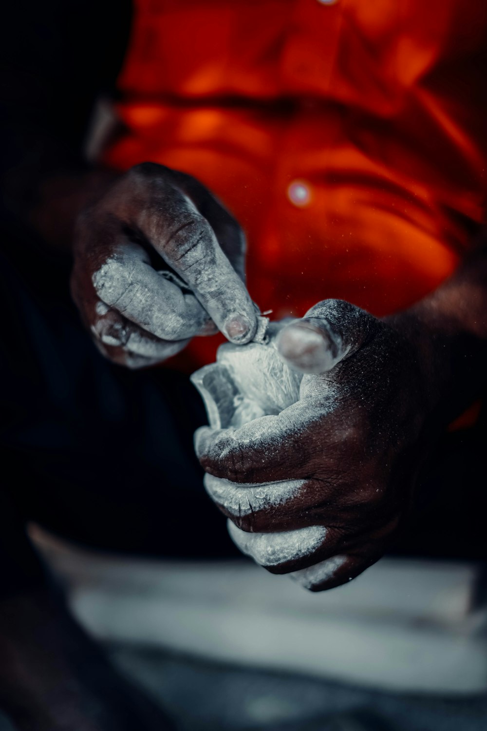 a close-up of a hand with a gloved hand