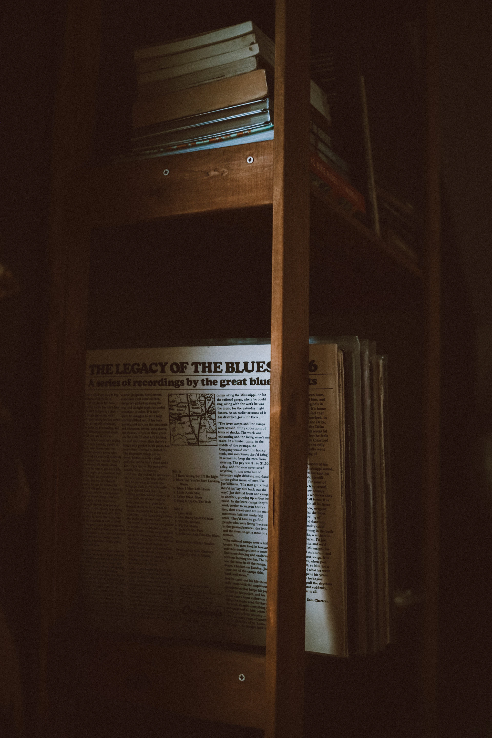 The album cover art for 'Box of Blues' featuring moody blue tones and a vintage microphone against a dark background.