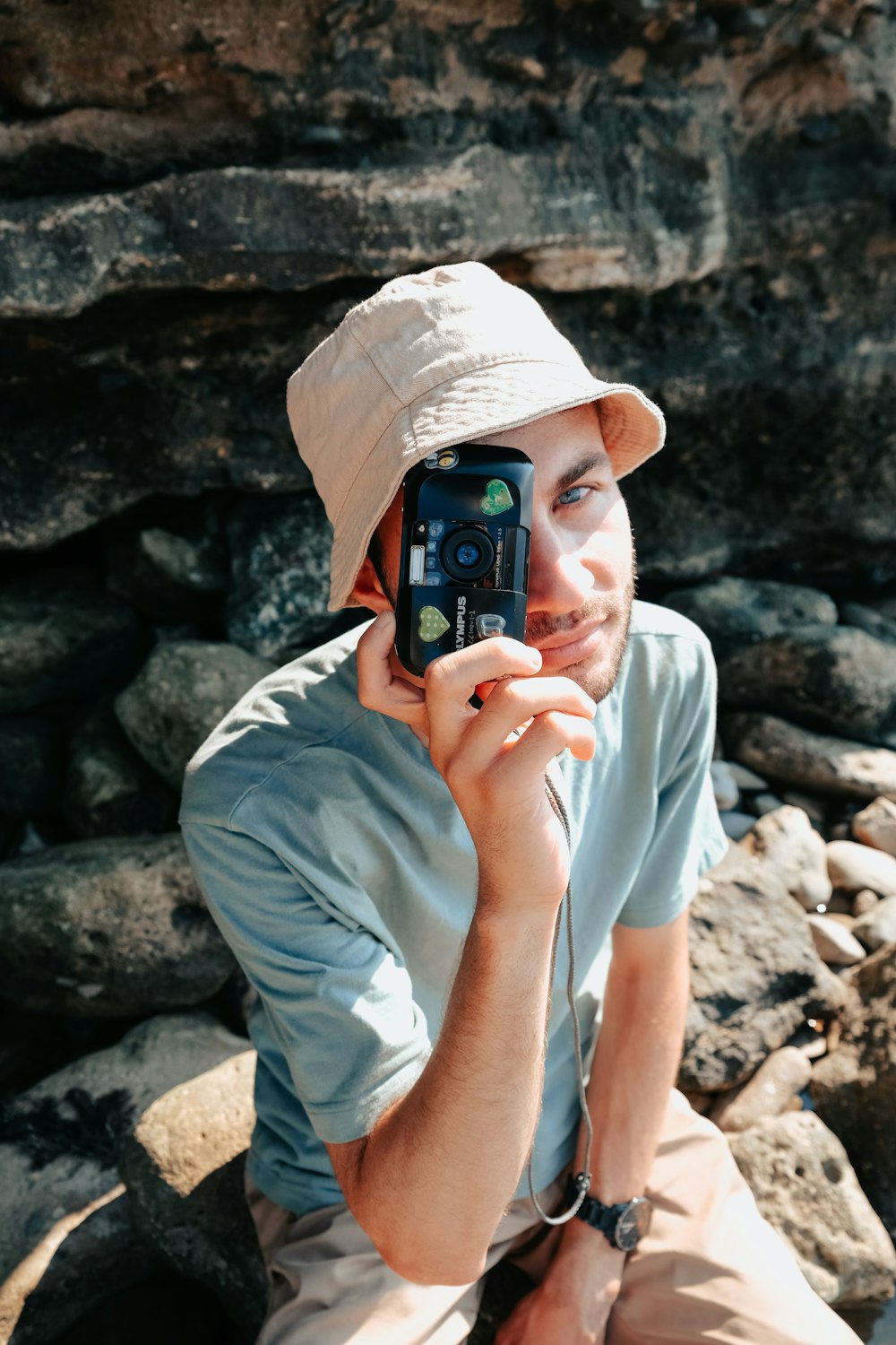 a person holding a camera