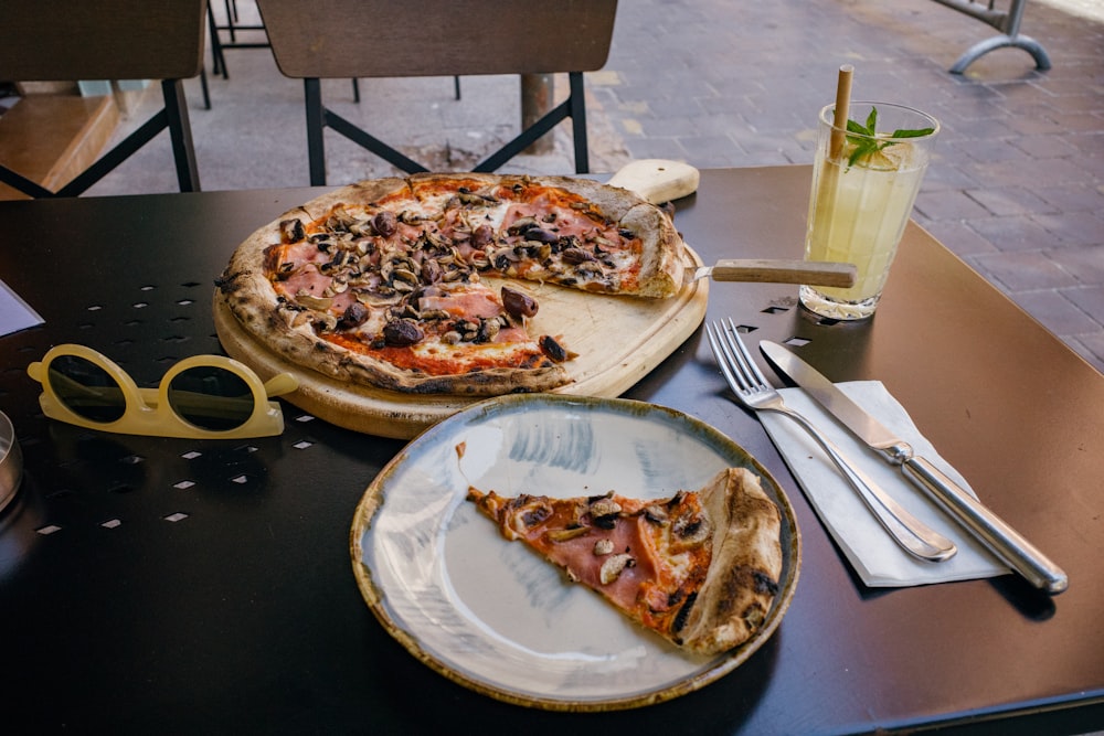 pizzas on plates on a table