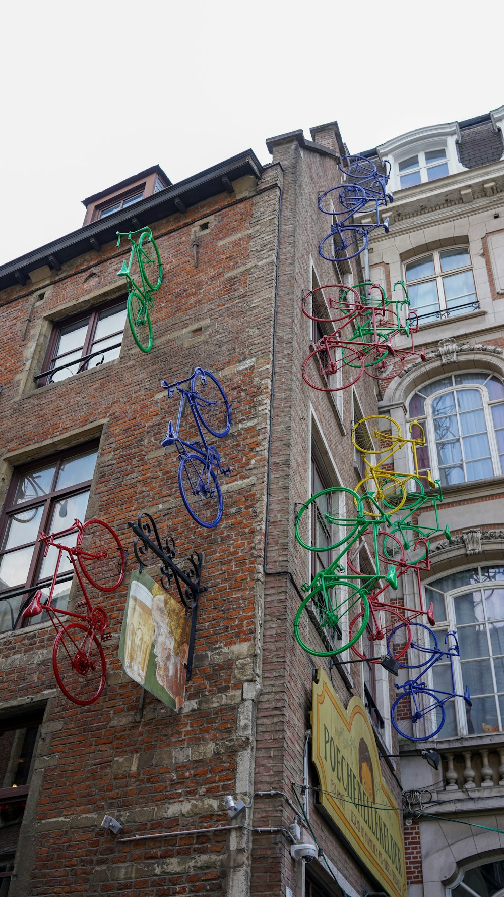a building with bicycles from the roof