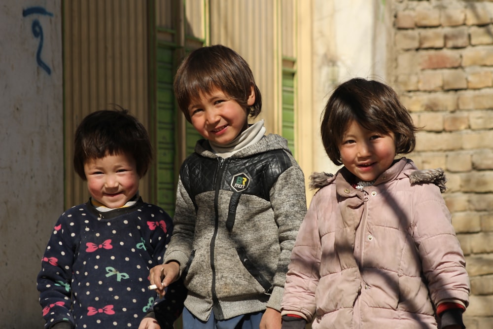 a group of children smiling