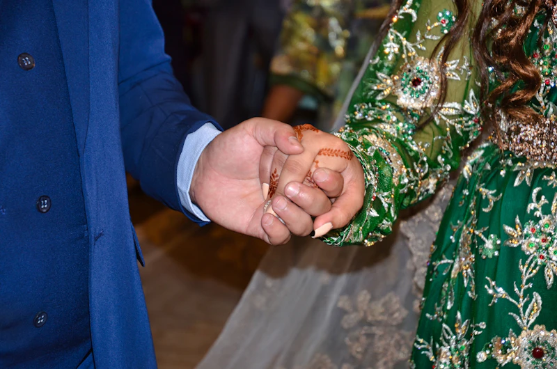 a person holding a bouquet of flowers
