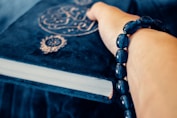 a person's hand with a tattoo on it
