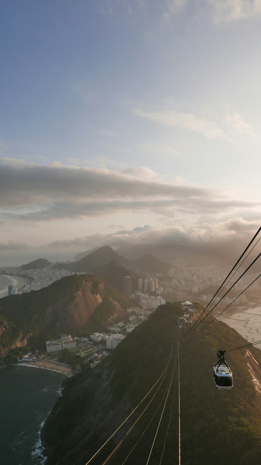 a cable car going over a city