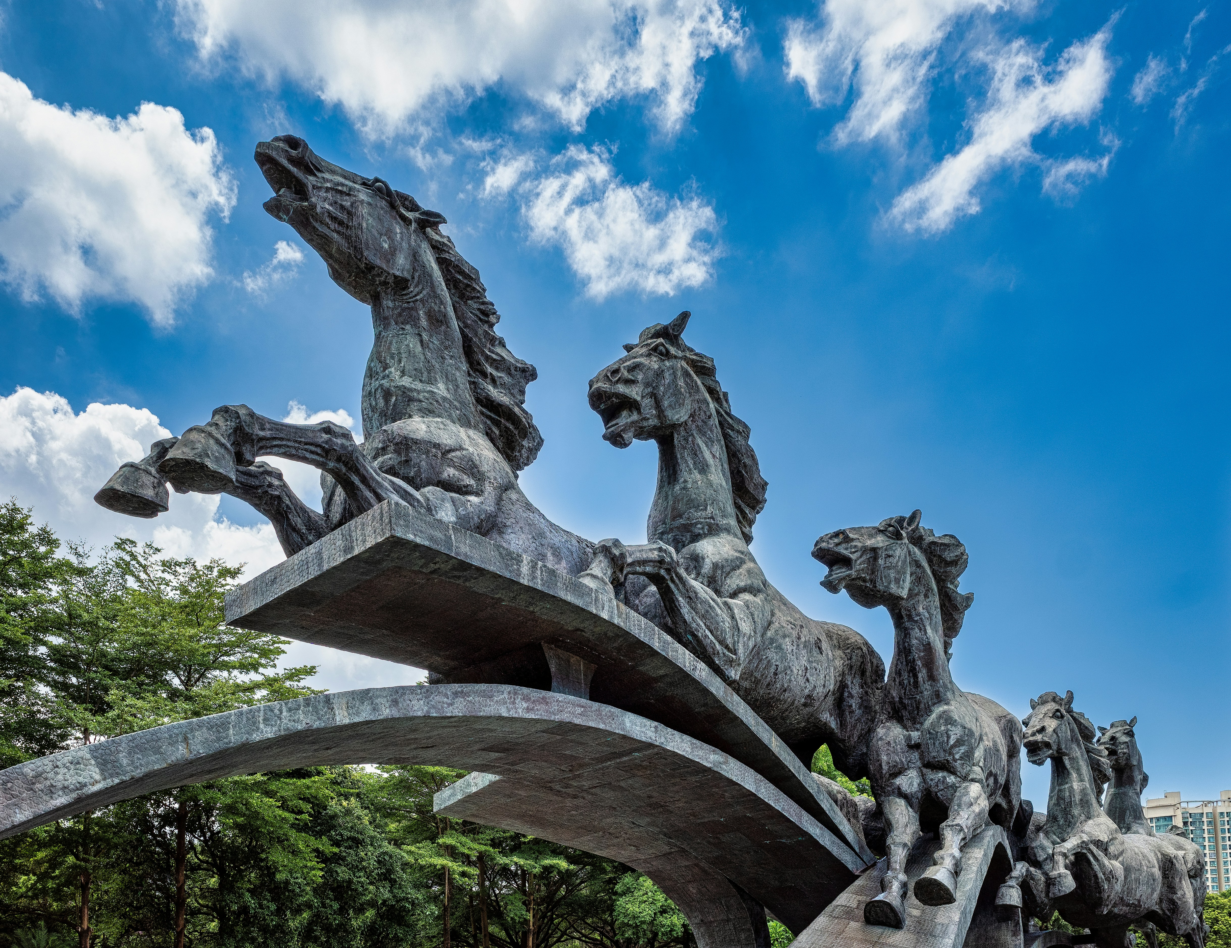 a statue of a person riding a horse