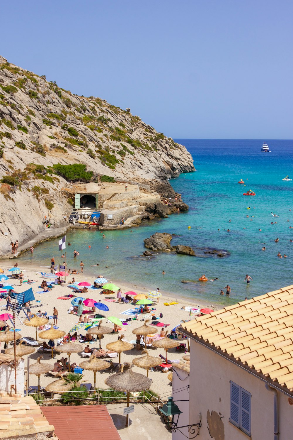 a crowded beach with people