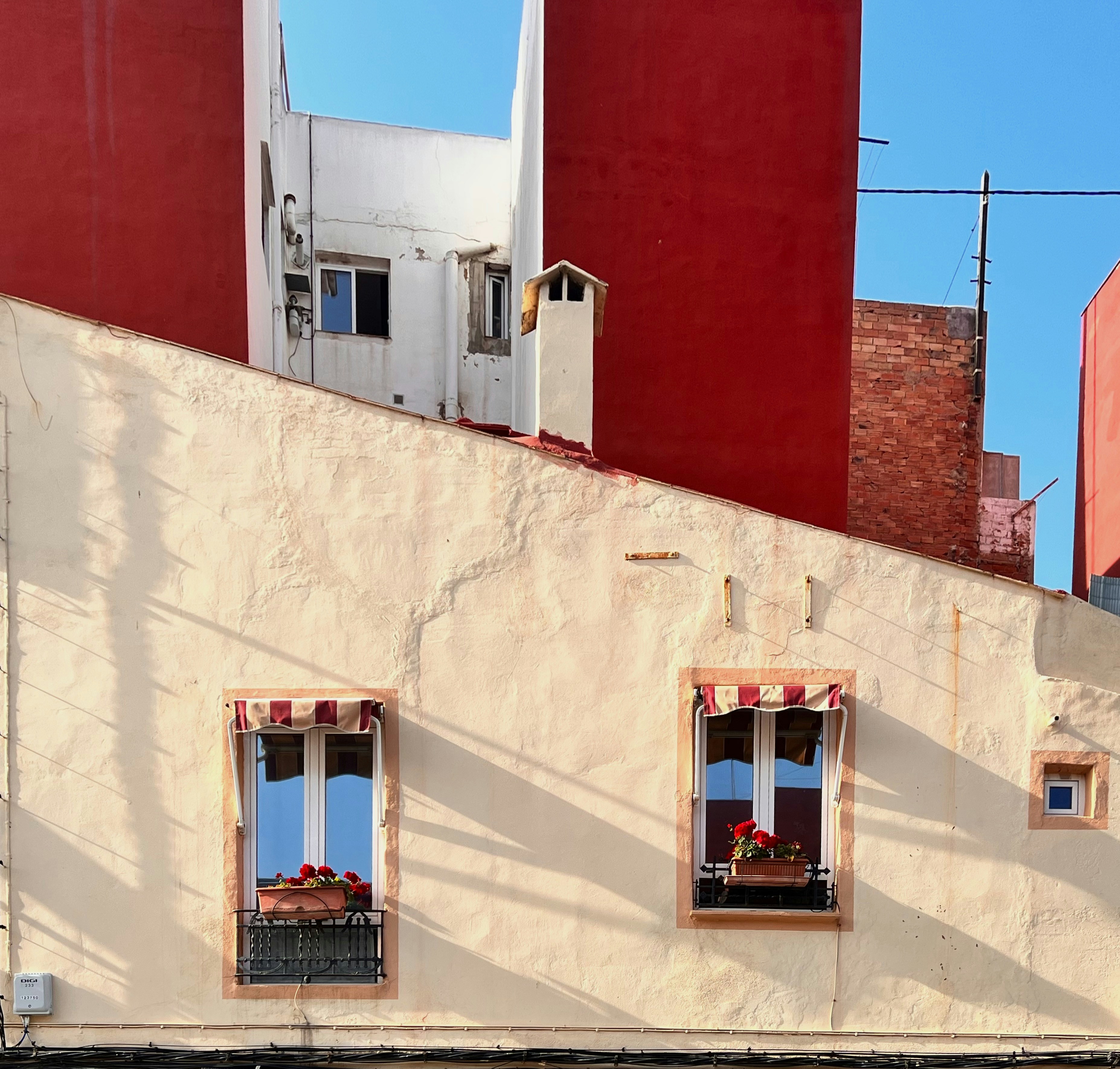 Shaded riad courtyard with fountain and zellige tiles