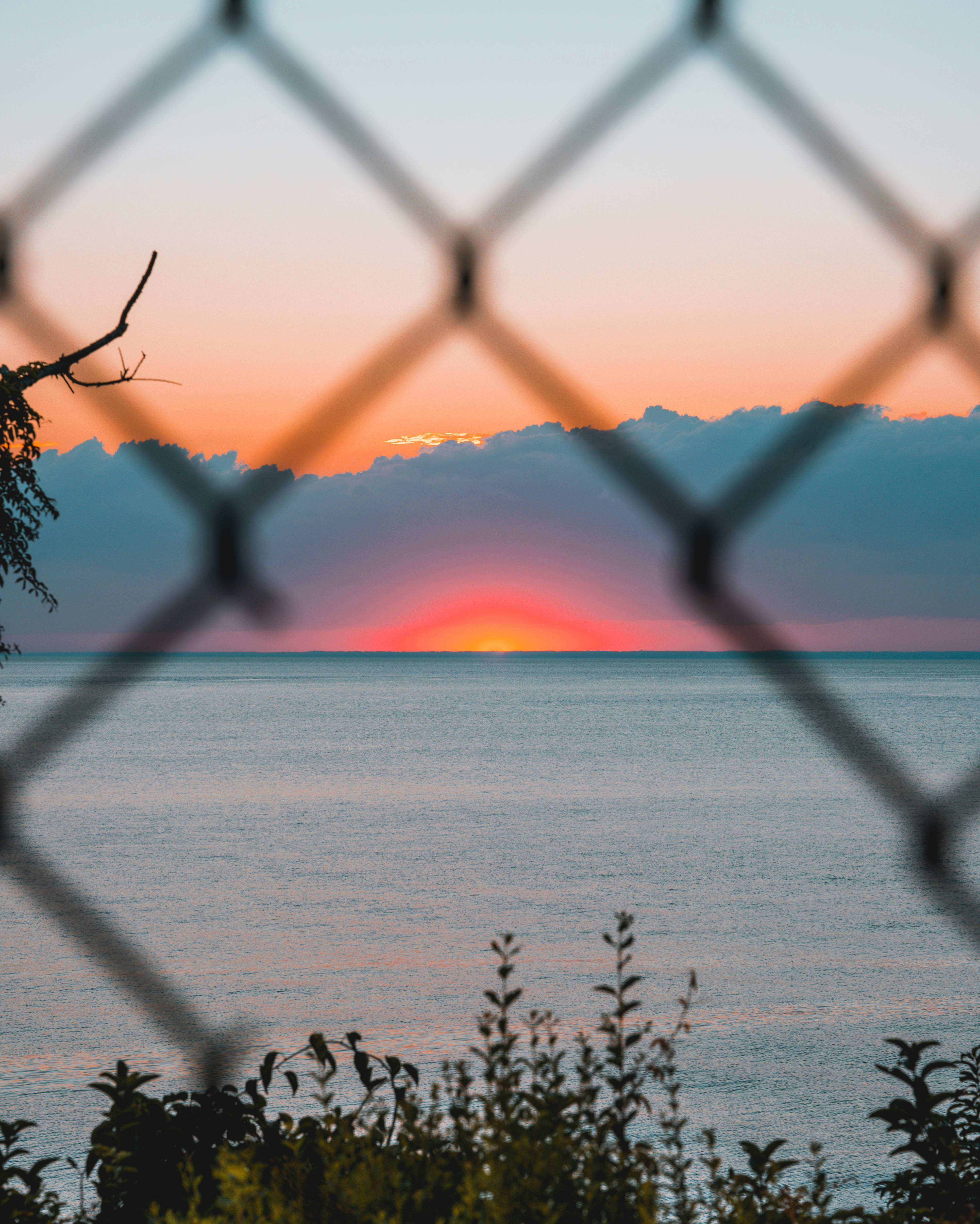 a sunset over a body of water