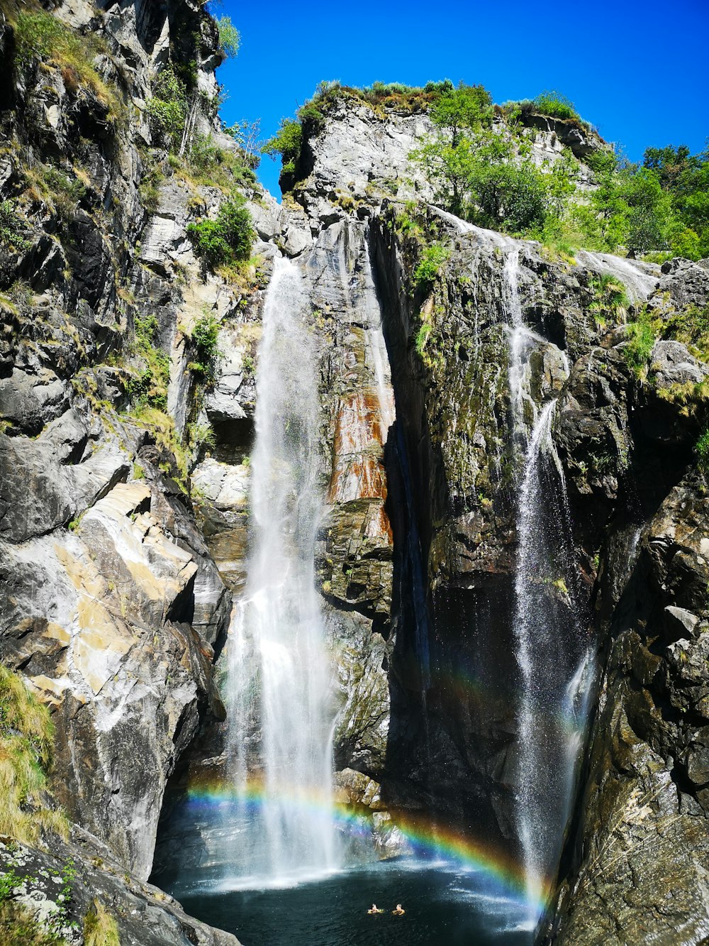 a waterfall in a rocky area