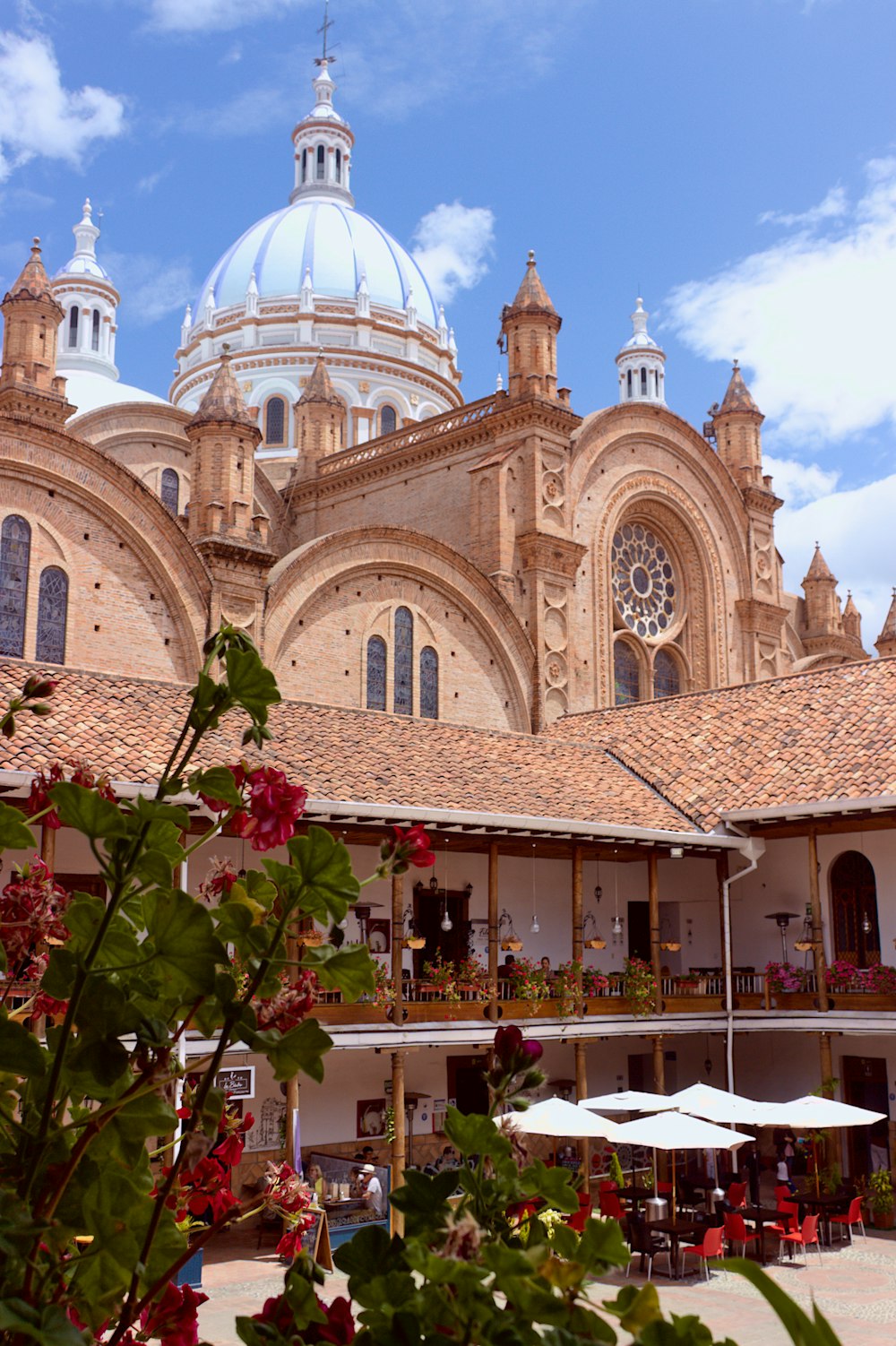 a building with a dome and a clock on it