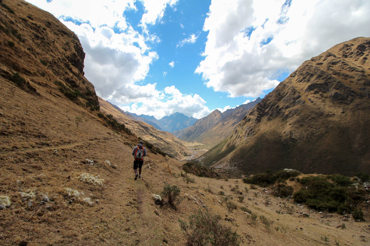 Hiker on a mountain trail in the High Atlas, Morocco