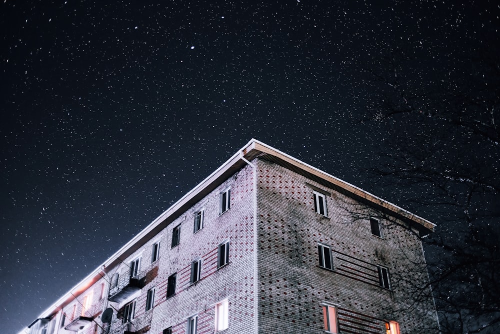 a building with a starry sky above it