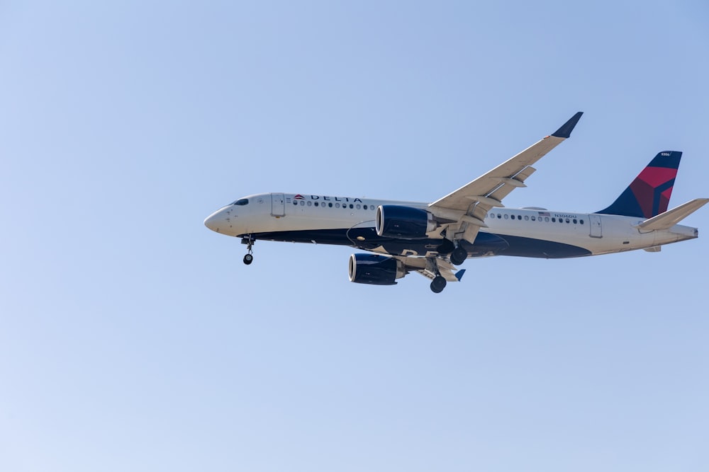 a large airplane flying in the sky