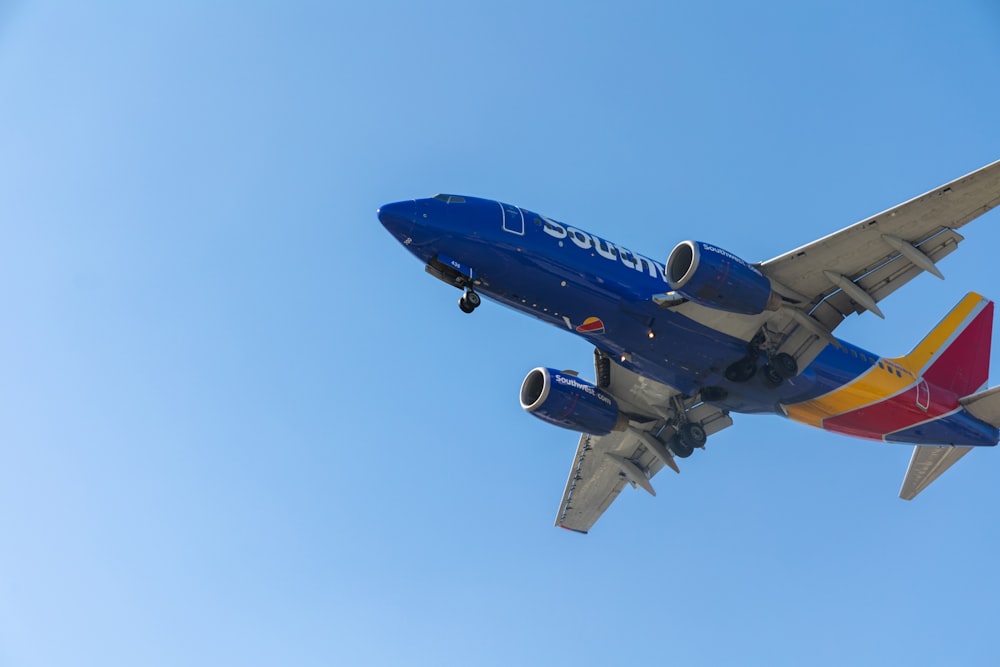 a large airplane flying in the sky