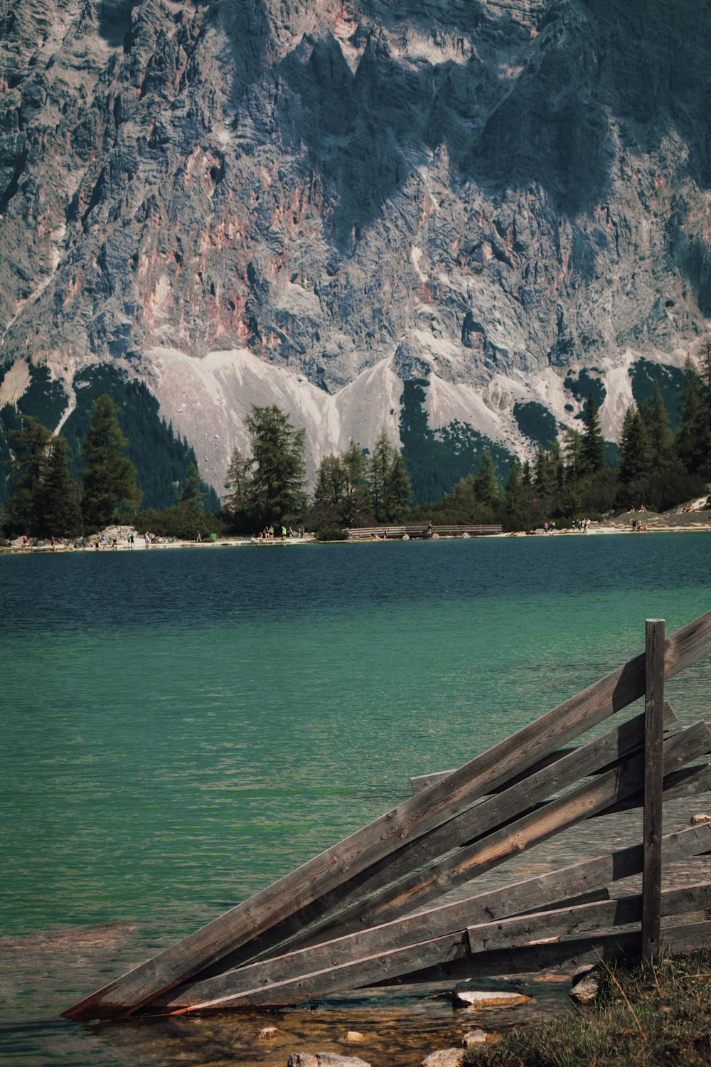 a wooden bench overlooking a lake