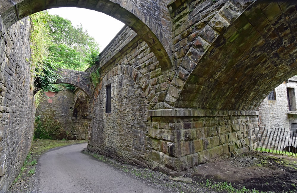 a stone building with a stone walkway