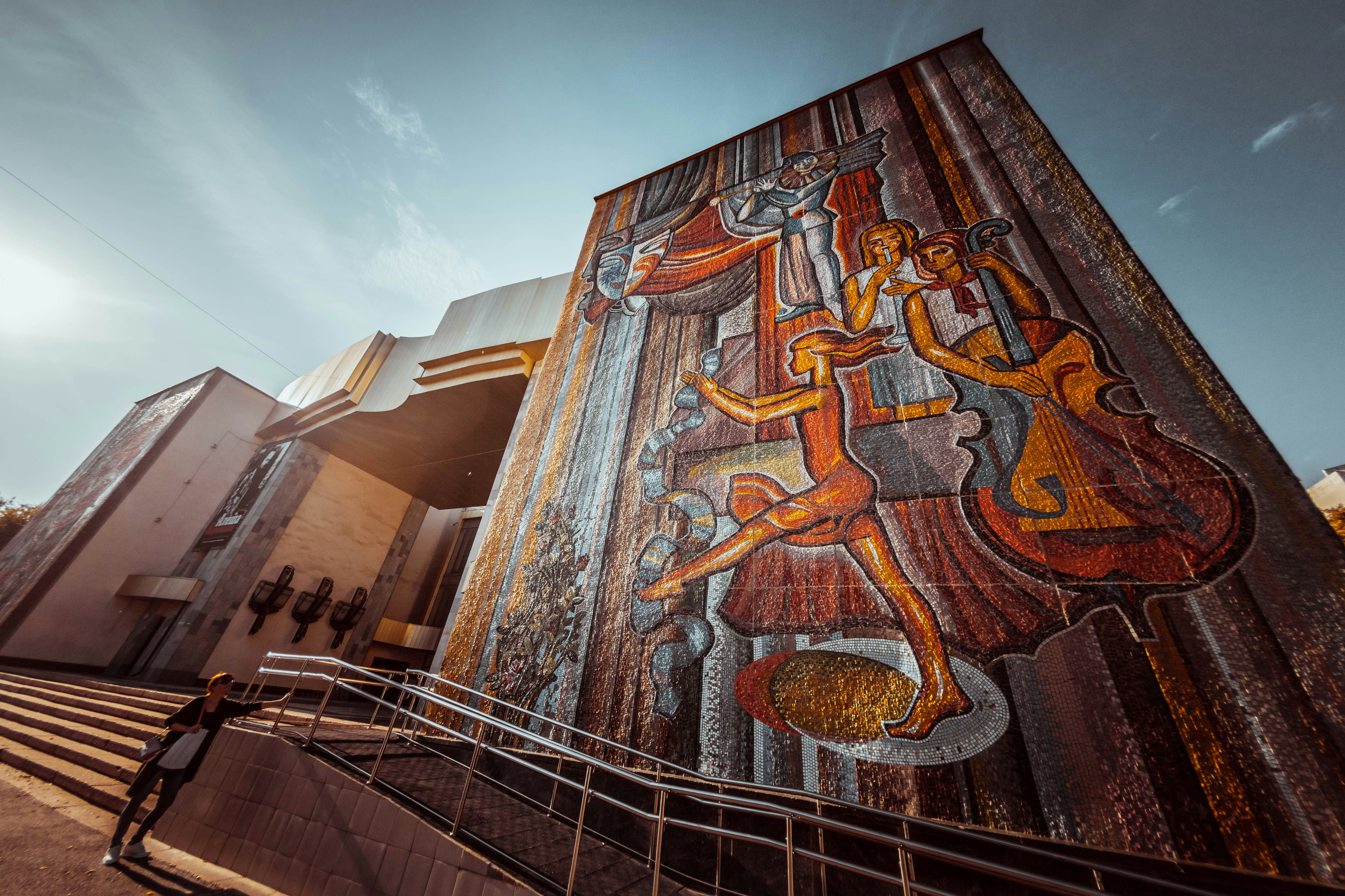 a large sculpture of a person with a large head