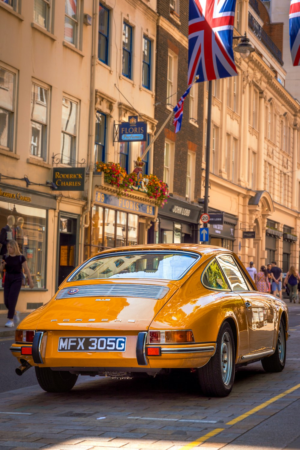 a yellow car on the street