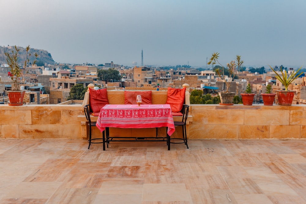 a couch and table on a deck