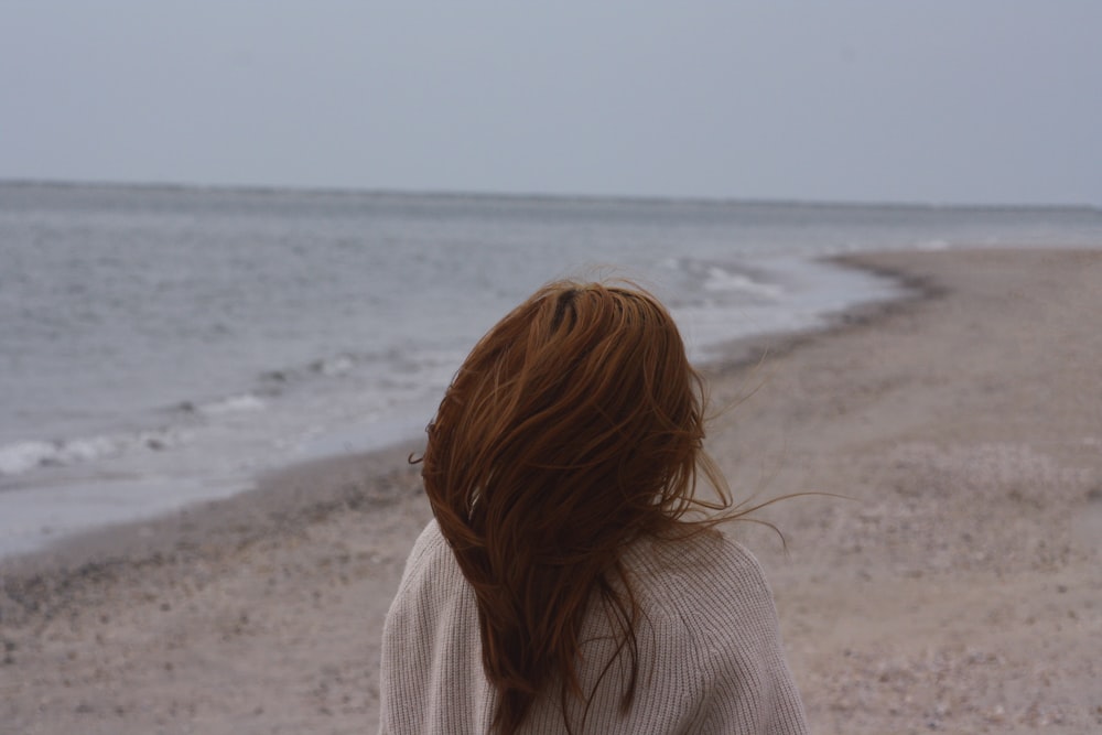 a person standing on a beach