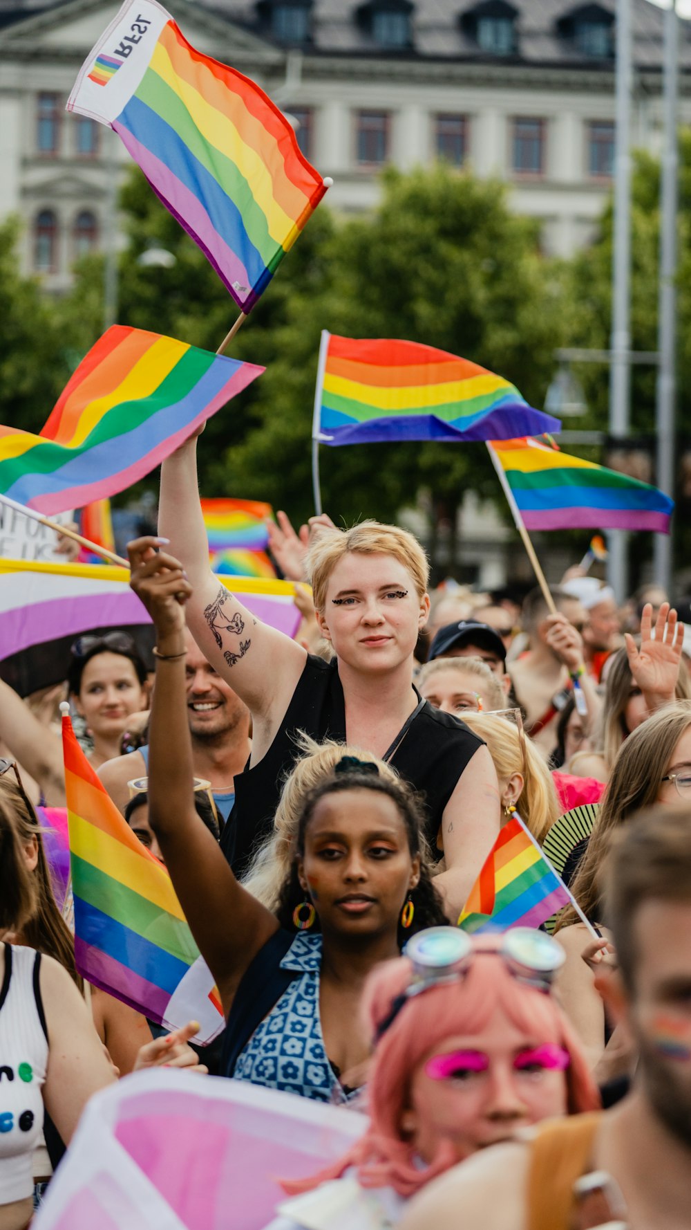 a group of people holding flags