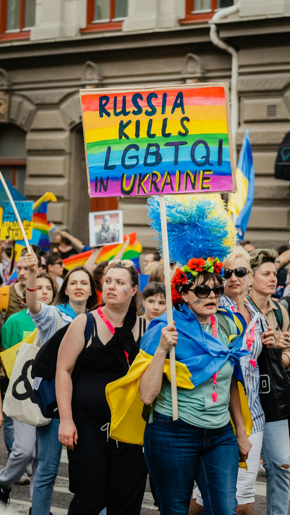 a group of people holding signs