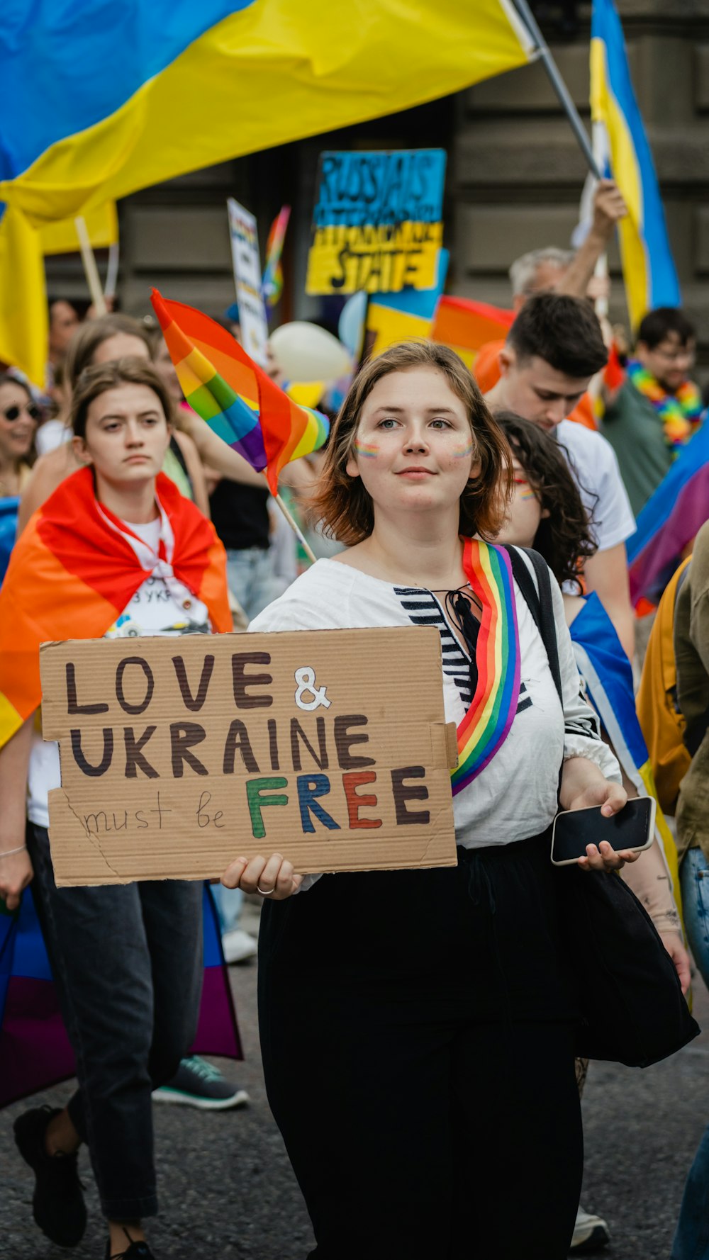 a group of people holding signs