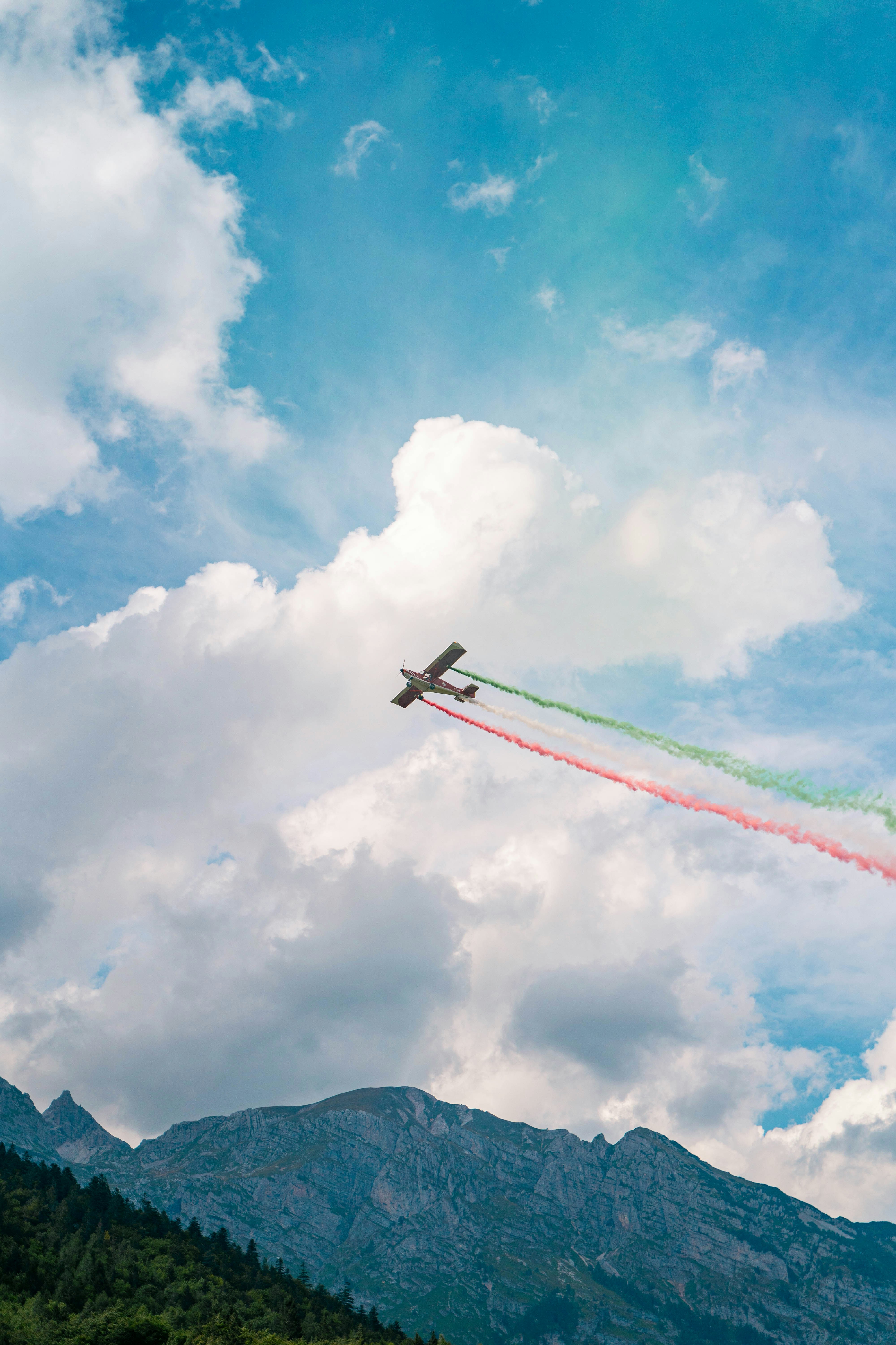 a couple of airplanes flying in the sky