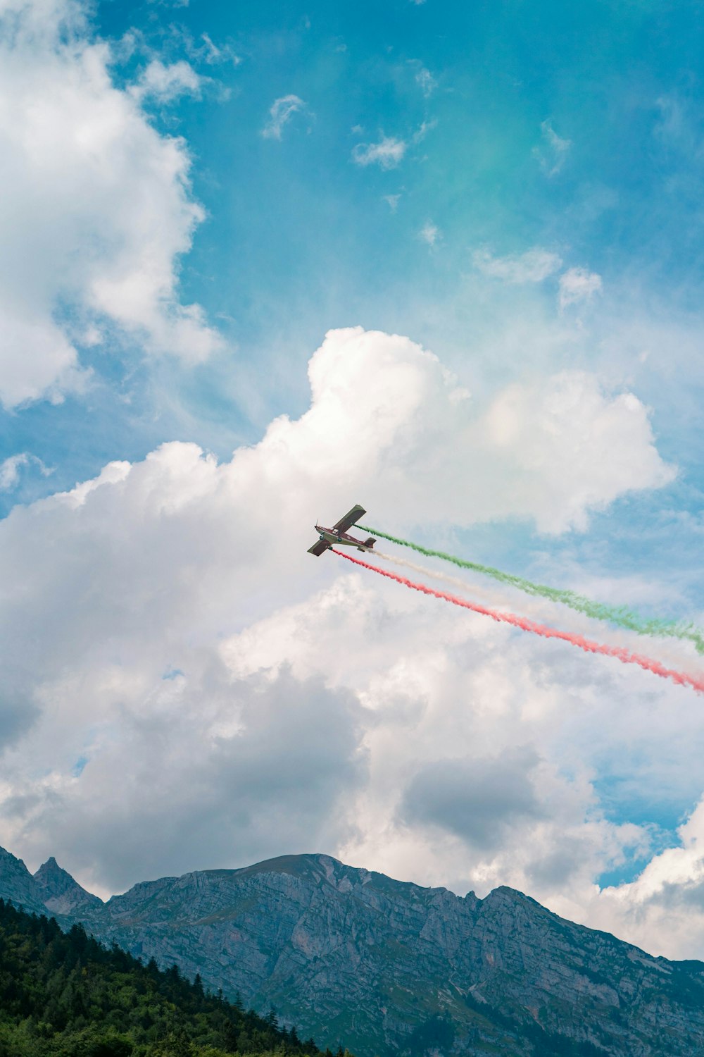 a couple of airplanes flying in the sky