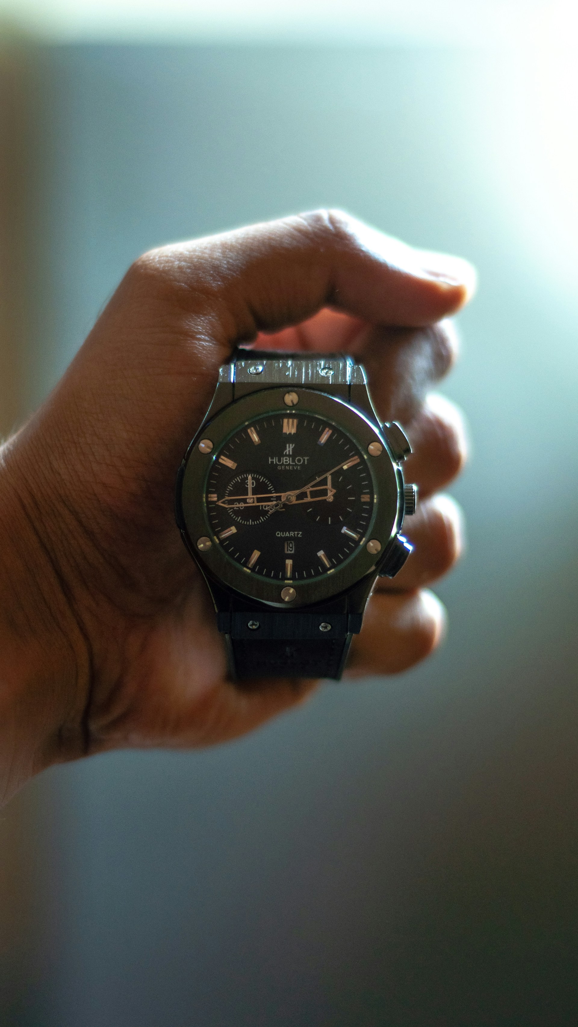 a person holding a watch