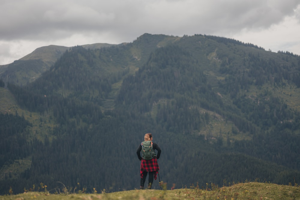 a man standing on a hill