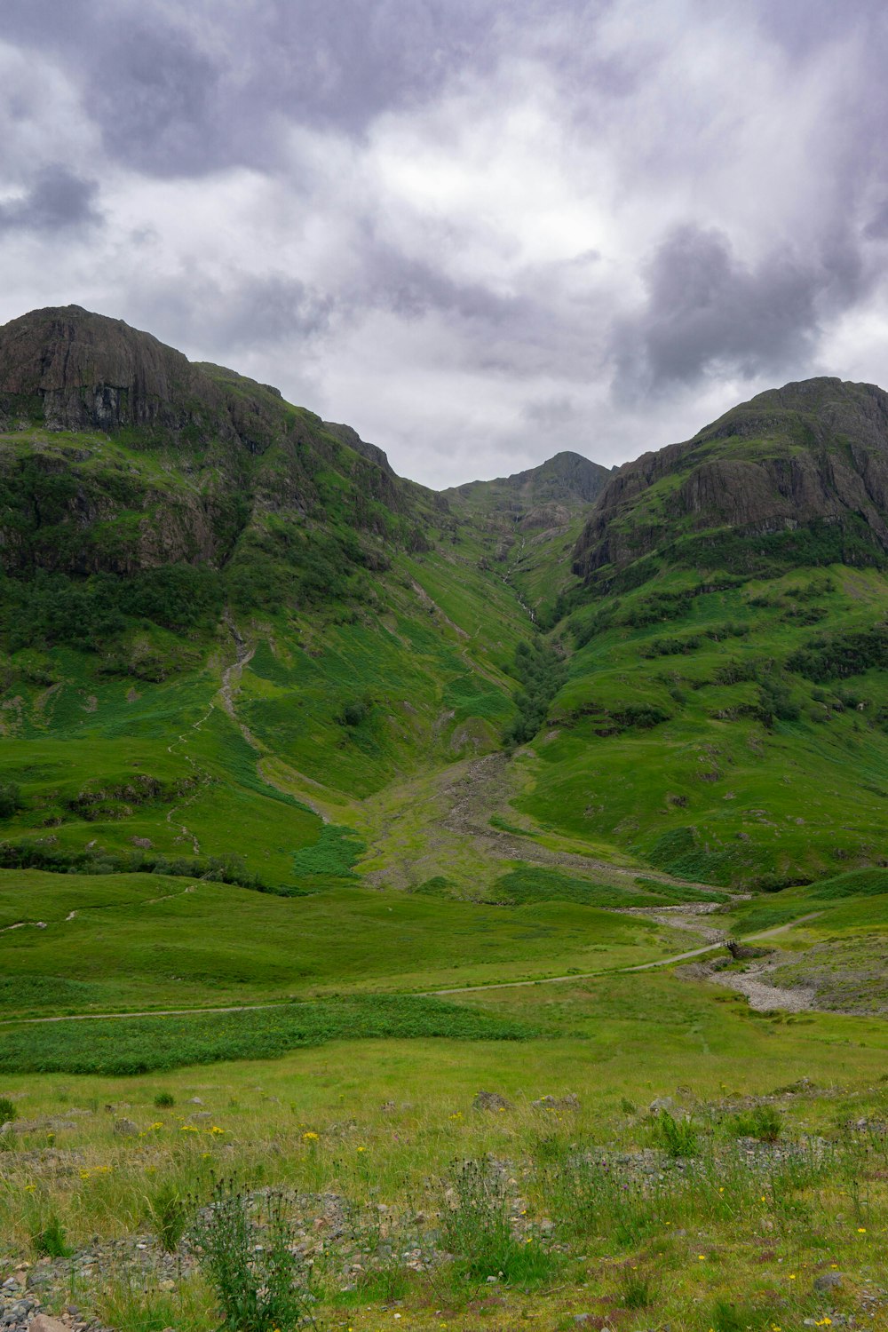 a valley with a river running through it