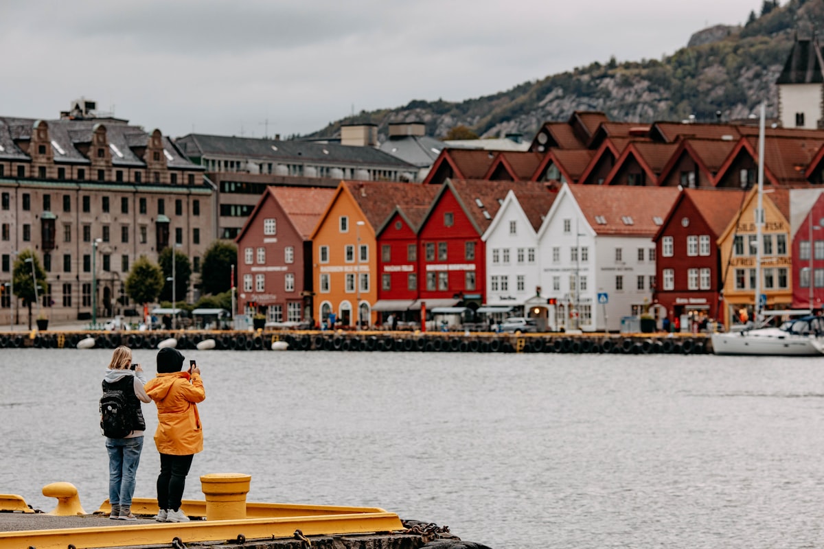 Nordnes Bergen — white timber houses lining a quiet cobbled street