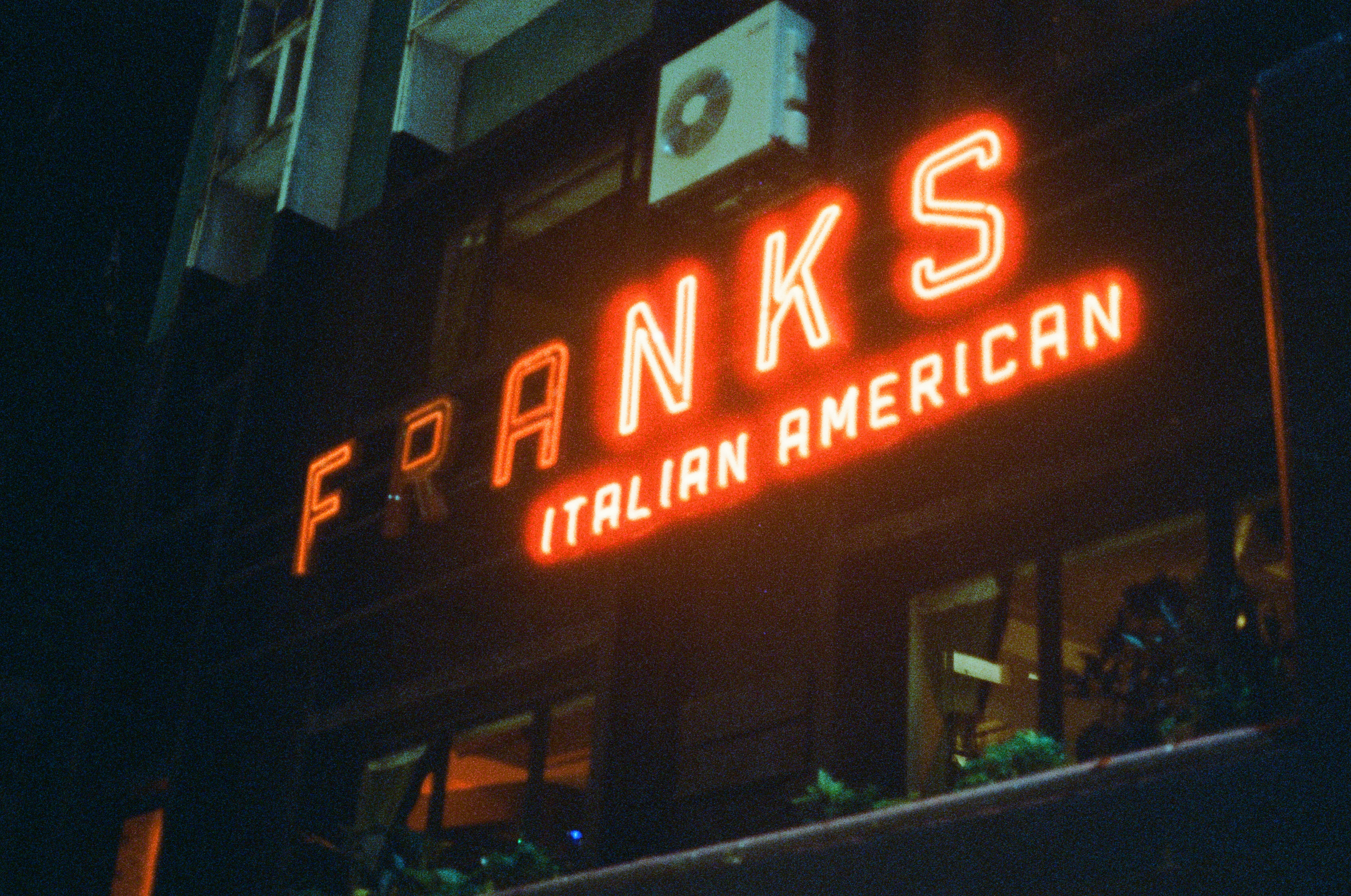 a sign on a building, Night in Soho, Central, Hong Kong. Canon AE-1, Tungsten EI 800T