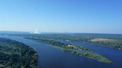 Researchers conducting lung health assessments in a riverside Amazonian village.