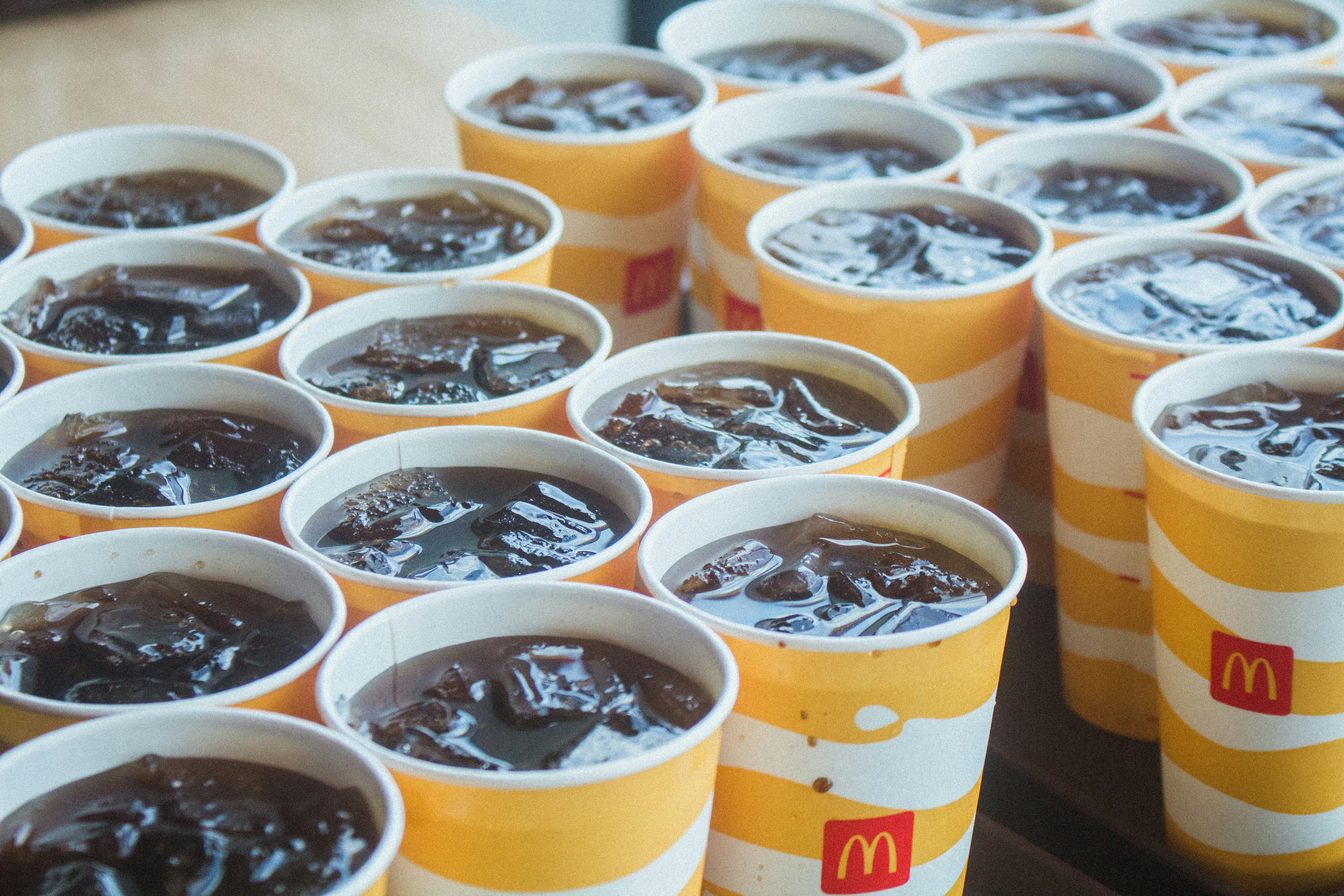 a group of cups with liquid in them