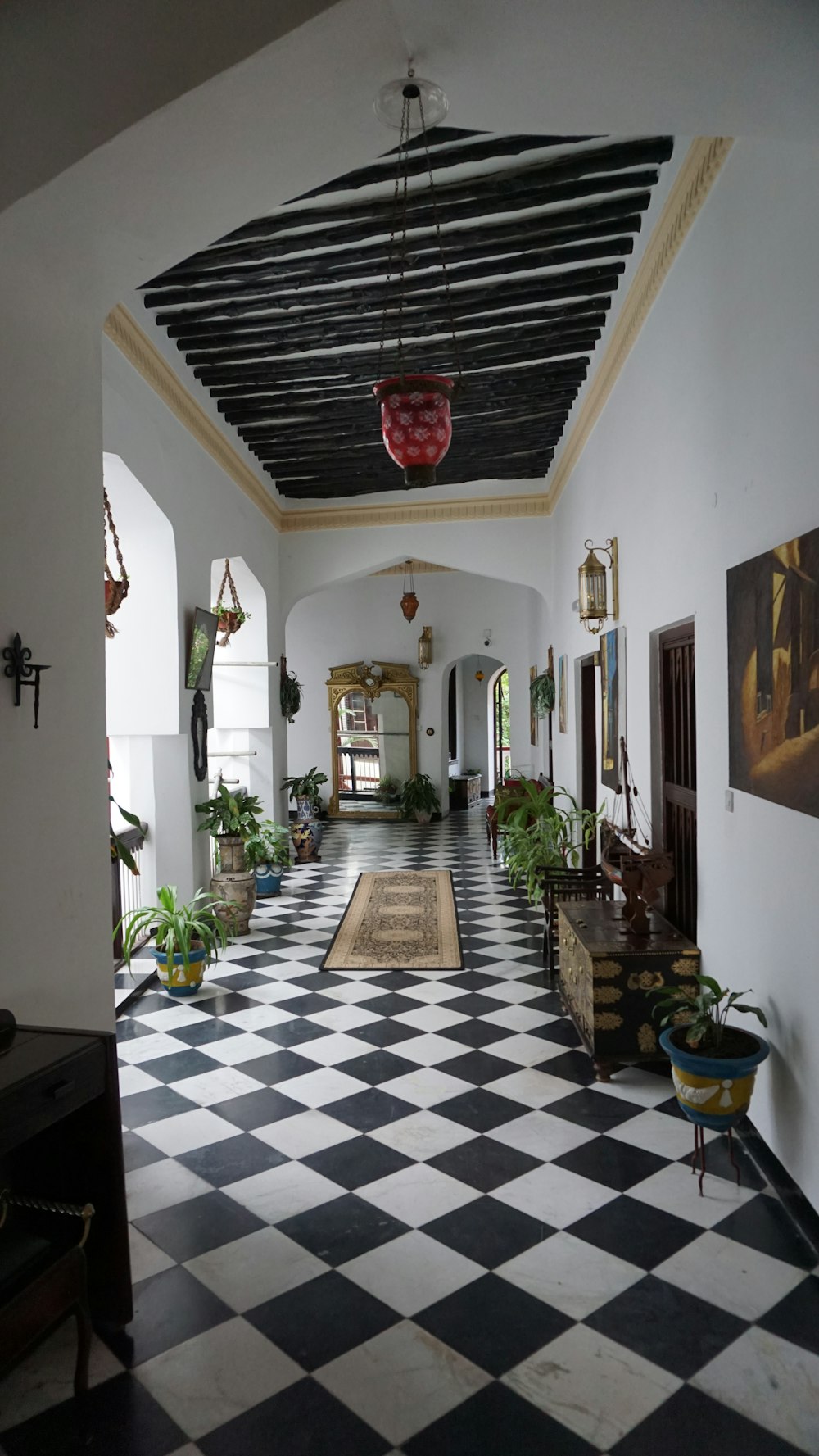 a room with a black and white checkered floor