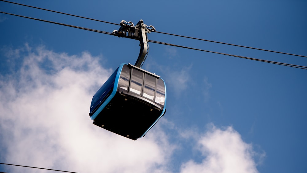 a blue cable car